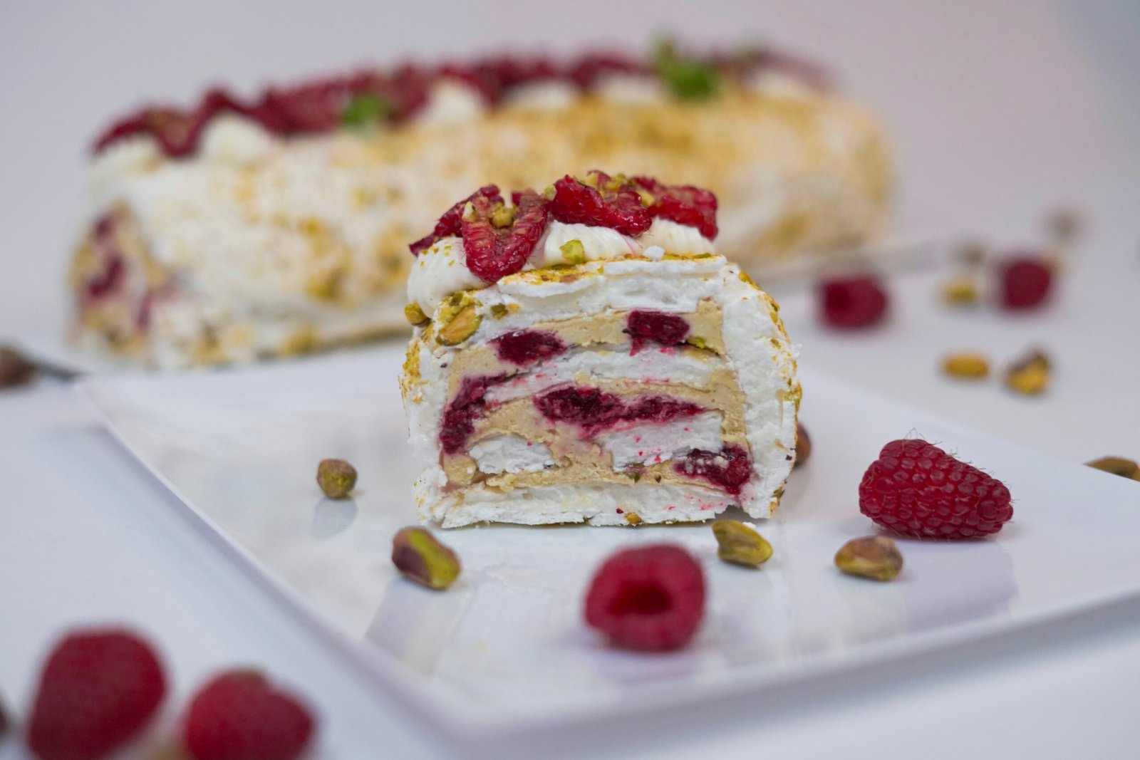 Pistachio Raspberries Meringue Roll